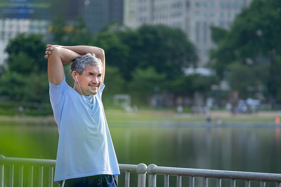 Man stretching after run